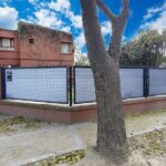 Tela para Cerco Gris Premium con Ruedo